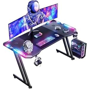 DLONGONE 120 x 60cm RGB Gaming Desk, Large Gaming Table for Laptop, Home Office Desk with Carbon Fiber Coated, Gaming PC Desk with Headphone Hook and Cup Holder, Easy to Assemble, Black